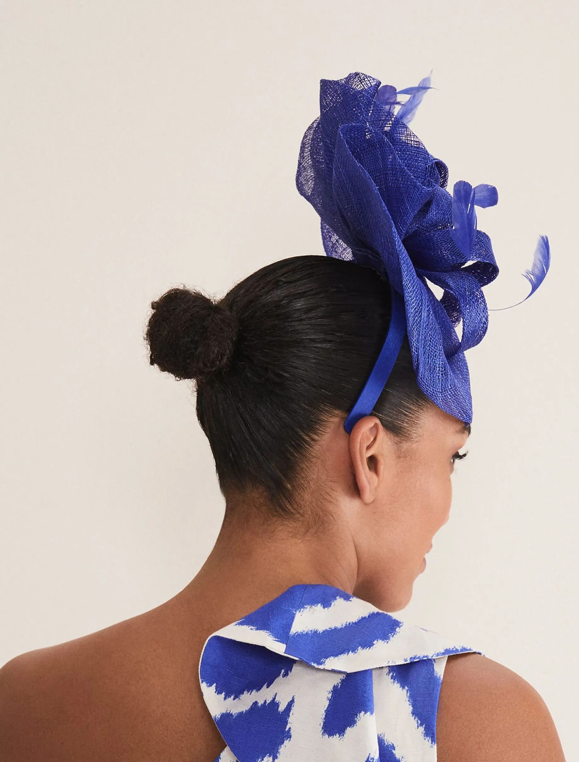 Purple Bow And Feather Fascinator