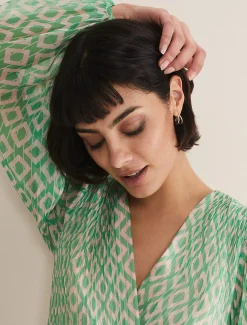 Twist Huggie Hoop Earrings